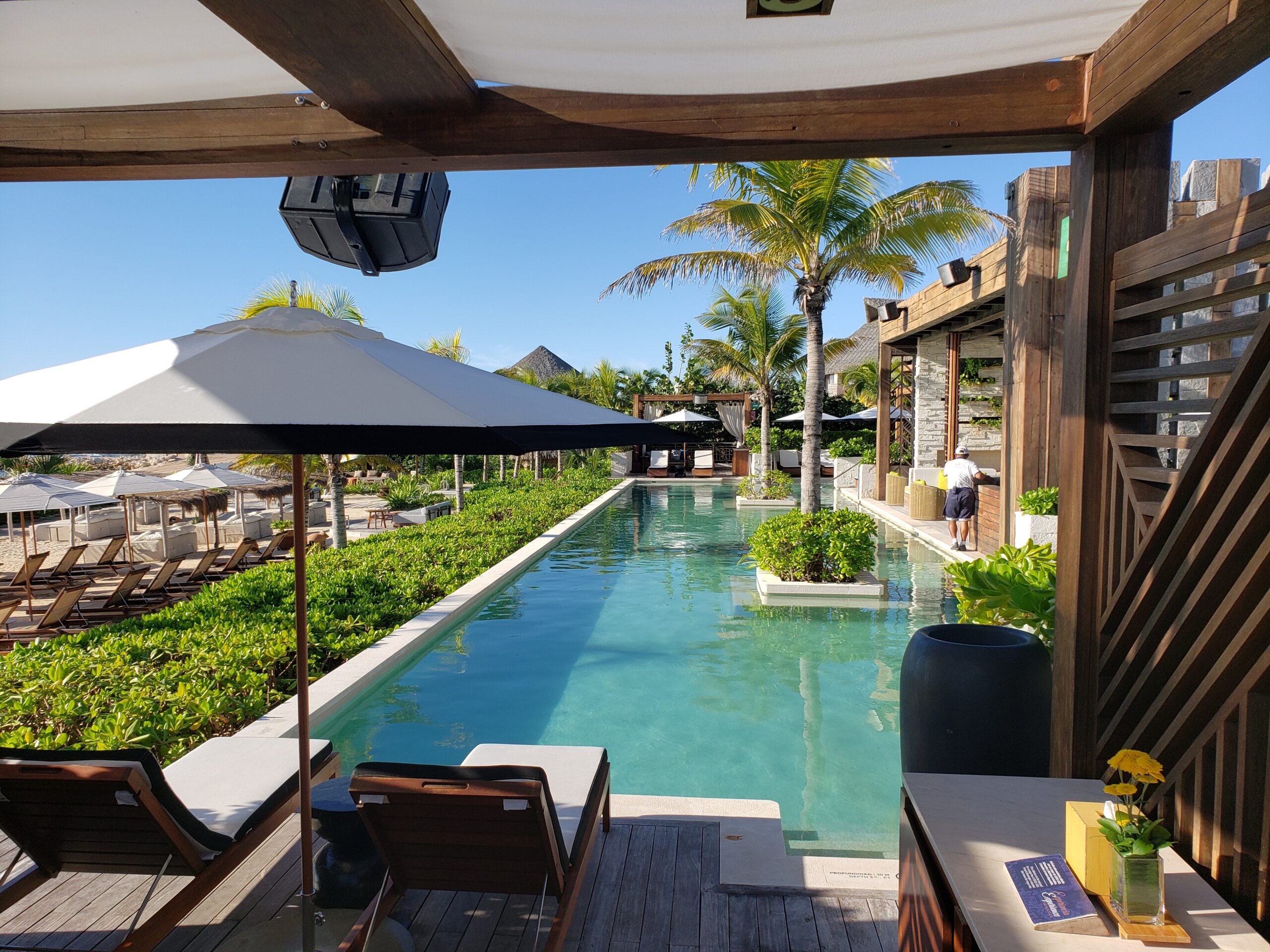 luxurious-poolside-with-cozy-cheizlong-and-rooftop-2022-11-15-20-53-26-utc