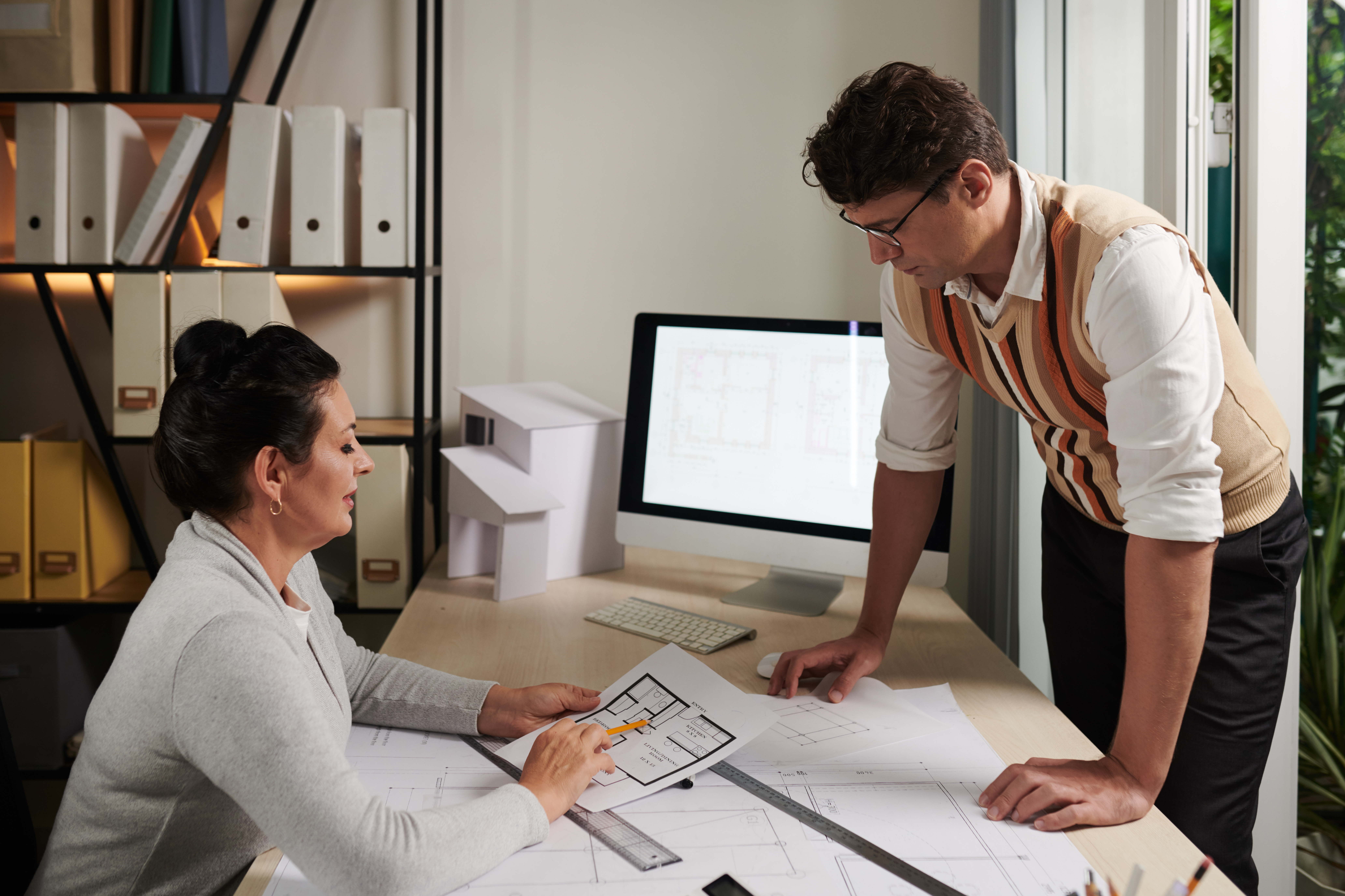 Architects Discussing Floor Plan